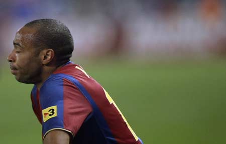 体坛英语新闻：Henry blames personal problems for difficulties at Barcelona