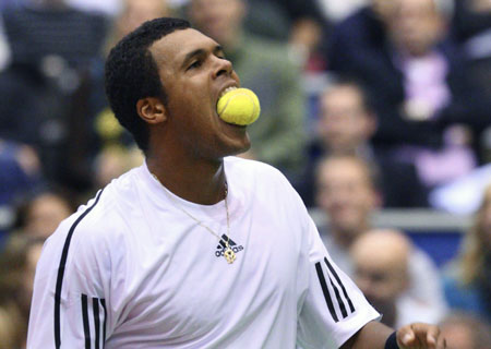 Jo-Wilfried Tsonga of France reacts during his quarter-final match against Rafael Nadal of Spain at the World Indoor Tennis Tournament in Rotterdam February 13, 2009. 