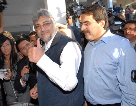 Paraguayan presidential candidate Fernando Lugo gives a thumb-up after he votes in a polling station near Asuncion, Paraguay, on April 20, 2008.Lugo won Sunday's Paraguayan presidential elections.