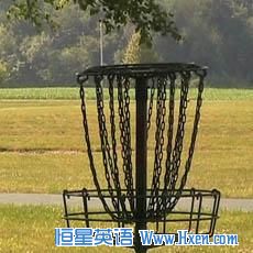 Instead of shooting for a hole on the green, disc golf players aim for a raised metal basket. Instead of shooting for a hole on the green, disc golf players aim for a raised metal basket.