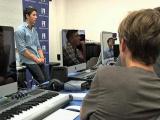 VOA慢速英语:Music Stars Share Their Trade with Kids at Grammy Camp