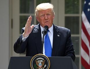 国际英语新闻:Trump says won't let Syria's Assad get away with 