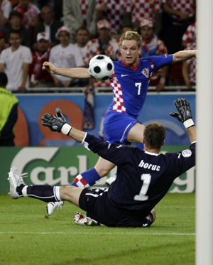 Poland's goalkeeper Artur Boruc (1) saves a shot from Croatia's Ivan Rakitic during their Group B Euro 2008 soccer match at the Woerthersee Stadium in Klagenfurt June 16, 2008.