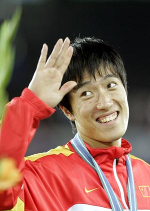 File photo taken on Aug. 12, 2005 shows Chinese hurdler Liu Xiang attending the awarding ceremony of the men's 110m hurdles at the 10th IAAF World Athletics Championships in Helsinki, Finland. Liu Xiang won the silver medal in the event with a time of 13.08 seconds.