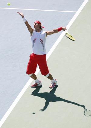 Rafael Nadal of Spain serves during the 4th round of the men's singles event against Sam Querrey of the United States at the US Open 2008 held in New York, the United States, Sept. 1, 2008. Nadal won the match 3-1 and advanced to the next round. (Xinhua/Hou Jun)